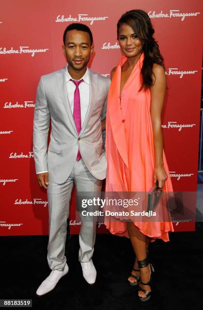 Musician John Legend and Christine Teigen attend the Ferragamo event with Debi Mazar and Adrian Grenier to benefit the L'Aquila earthquake victims at...