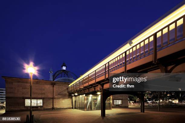 subway station berlin - nollendorfplatz with arriving subway (berlin-schöneberg, germany) - berlin nightlife stock pictures, royalty-free photos & images