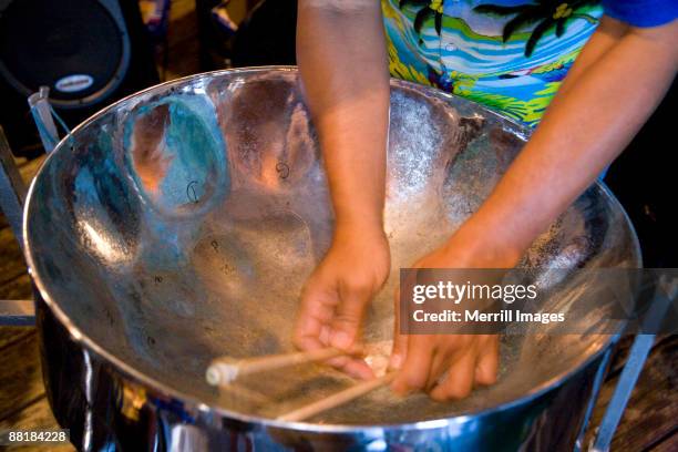 esperanza.  man playing steel drum - steel drum imagens e fotografias de stock