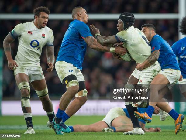 Piula Fa'asalele of Samoa attempts to rip the ball from Maro Itoje of England during the Old Mutual Wealth Series autumn international match between...