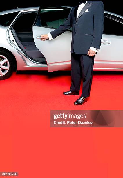 stretched limo on red carpet with security. - limo stockfoto's en -beelden
