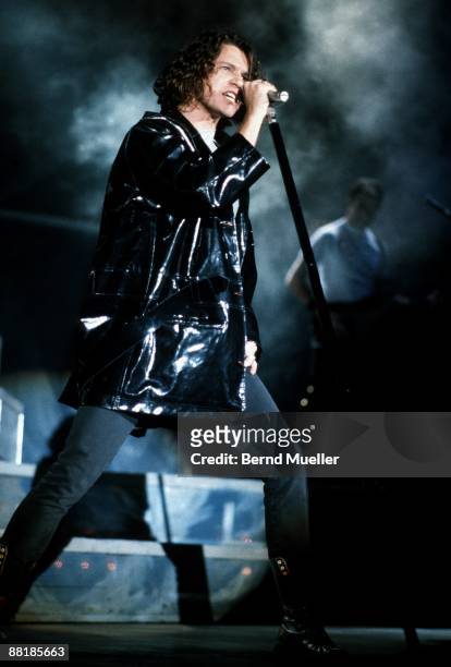 Michael Hutchence lead singer of Australian band INXS performs on stage at the Festhalle in Frankfurt, Germany on November 6 1990.