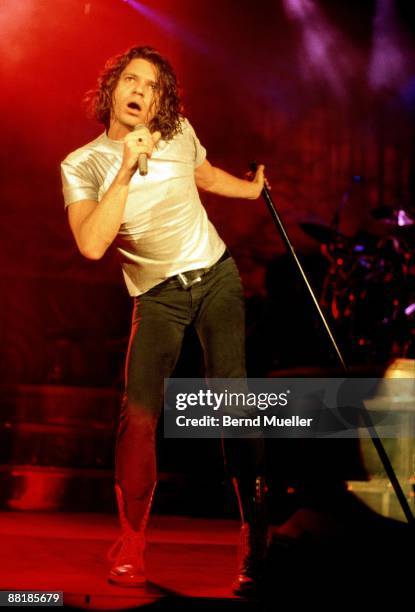 Michael Hutchence lead singer of Australian band INXS performs on stage at the Festhalle in Frankfurt, Germany on November 6 1990.