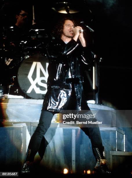 Michael Hutchence lead singer of Australian band INXS performs on stage at the Festhalle in Frankfurt, Germany on November 6 1990.