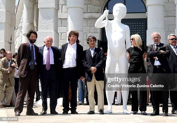 Massimo Cacciari, Francois Pinault, Charles Ray, Tadao Ando, Alison Gingeras and Francesco Bonami pose near 'The Boy with the frog' by Charles ray...