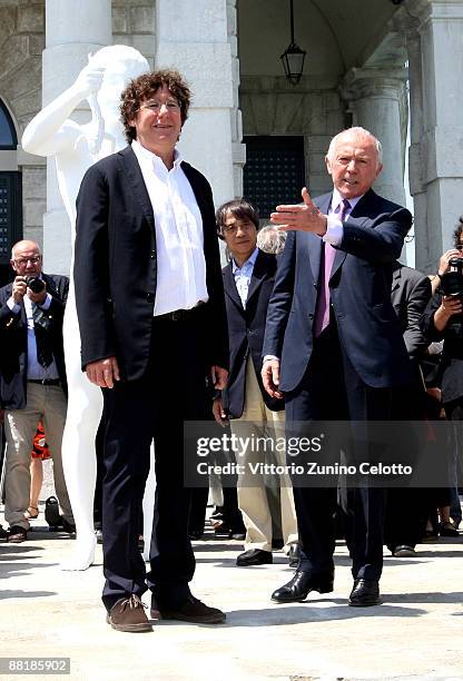 Charles Ray and Francois Pinault pose near 'The Boy with the frog' by Charles ray during the opening of The New Contemporary Art Centre at Punta...