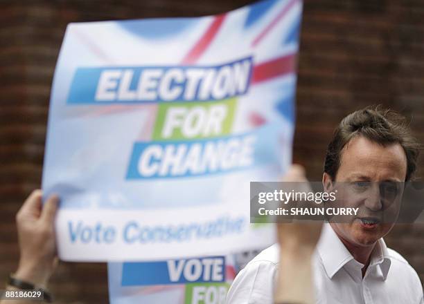 British Conservative party leader David Cameron holds a rally outside Hammersmith Town Hall in west London, on June 3, 2009. British Prime Minister...