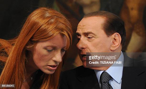 Italian Prime Minister Silvio Berlusconi and minister for tourism Michela Vittoria Brambilla give a joint press conference during a press conference...