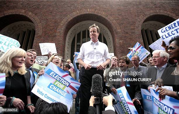 British Conservative party leader David Cameron holds a rally outside Hammersmith Town Hall in west London, on June 3, 2009. British Prime Minister...