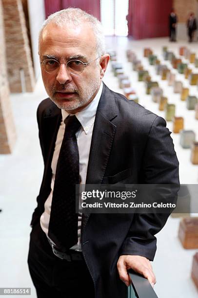 Mapping the Studio Exhibition curator Francesco Bonami poses during the press preview of the opening of the new contemporary art centre - Francois...