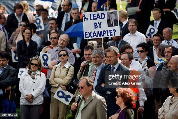 Employees attend a warning strike in front of the ECB headquarters on June 3, 2009 in Frankfurt am Main, Germany. European Central Bank staff hold...