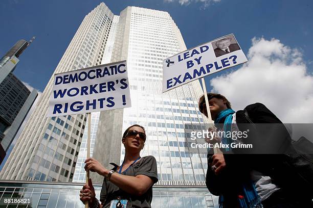 Employees pose during a warning strike in front of the ECB headquarters on June 3, 2009 in Frankfurt am Main, Germany. European Central Bank staff...