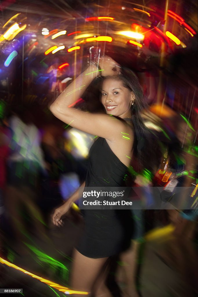 Woman dancing in club