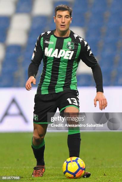 Federico Peluso of US Sassuolo in action during the TIM Cup match between US Sassuolo and Bari on November 29, 2017 in Reggio nell'Emilia, Italy.