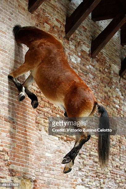Untitled' by Maurizio Cattelan is displayed during the press preview of the opening of the new contemporary art centre - Francois Pinault Foundation,...
