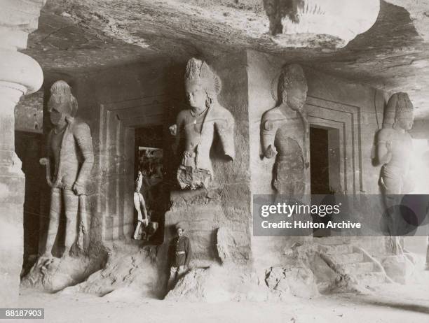 Sculptures of Hindu deities in the Elephanta Caves on Elephanta Island in Bombay Harbour, circa 1890.