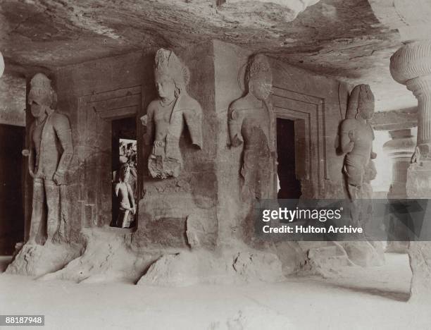 Sculptures of Hindu deities in the Elephanta Caves on Elephanta Island, Bombay Harbour, circa 1890.