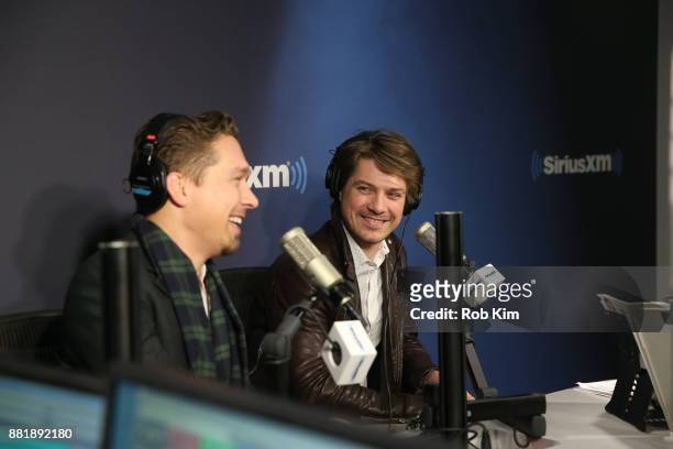 Isaac Hanson and Taylor Hanson of the band Hanson appear on 'The Jenny McCarthy Show' at SiriusXM Studios on November 29, 2017 in New York City.