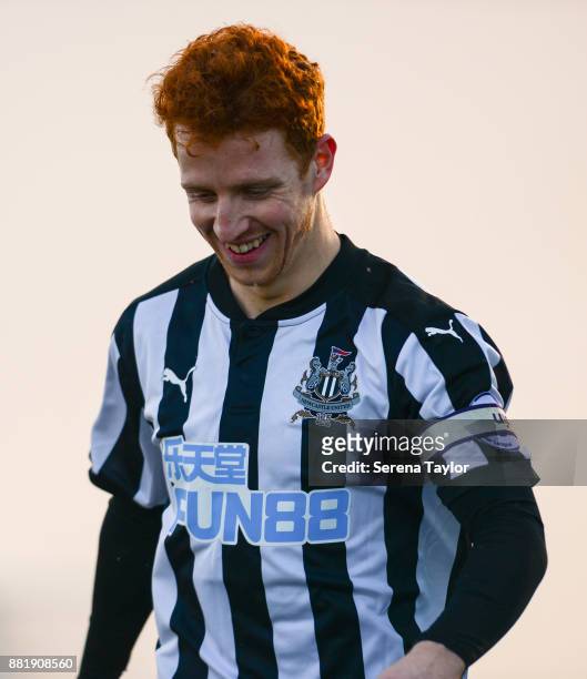 Jack Colback smiles as he walks outside for the Premier League 2 match between Newcastle United and Swansea City at The Newcastle United Academy on...