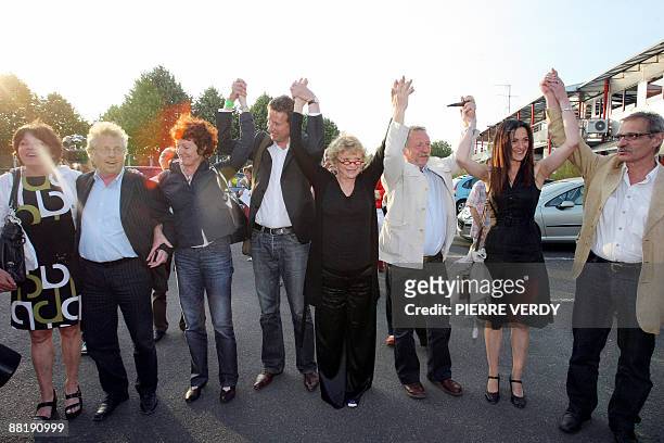 French candidates on the "Europe Ecologie" list pose upon their arrival at a meeting on June 3 in Paris, ahead of the European parliamentary...