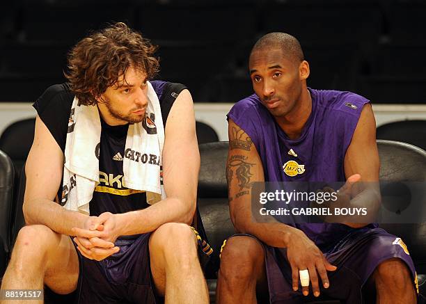 Lakers' players Pau Gasol and Kobe Bryant chat during a practice session at the Staples Center in Los Angeles, California, on June 3 on the eve of...