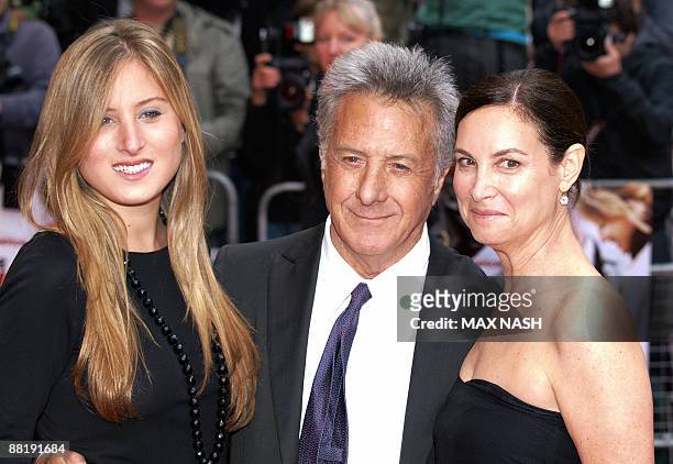 Actor Dustin Hoffman flanked by his wife Lisa, and his daughter Alexandra, stands up as he arrives for the British Premier of his latest film, 'Last...