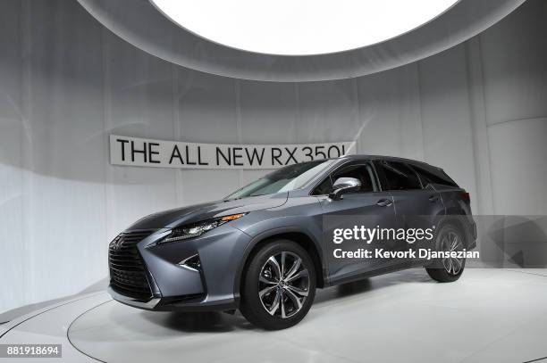 Lexus unveils the 2018 RX 350L during the auto trade show AutoMobility LA at the Los Angeles Convention Center November 29 in Los Angeles, California.