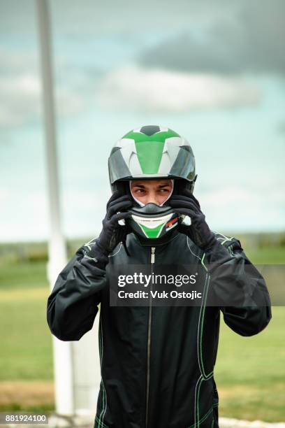 race driver - racing suit stock pictures, royalty-free photos & images