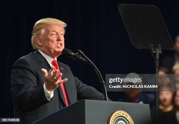 President Donald Trump speaks about taxes at the St. Charles, Missouri, Convention Center on November 29, 2017. / AFP PHOTO / Nicholas Kamm