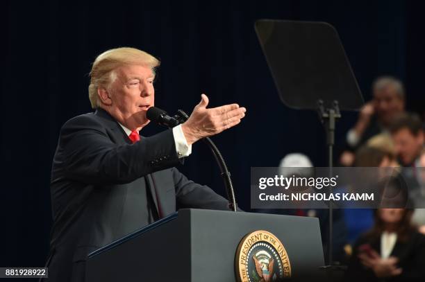 President Donald Trump speaks about taxes at the St. Charles, Missouri, Convention Center on November 29, 2017. / AFP PHOTO / Nicholas Kamm