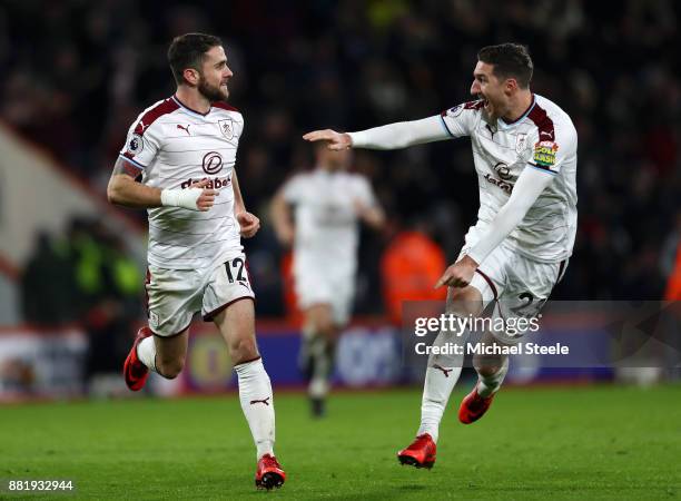 Robbie Brady of Burnley celebrates after scoring his sides second goal with Stephen Ward of Burnley during the Premier League match between AFC...