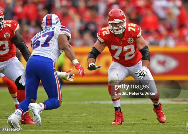 Offensive tackle Eric Fisher of the Kansas City Chiefs gets set to block linebacker Lorenzo Alexander of the Buffalo Bills during the first half at...