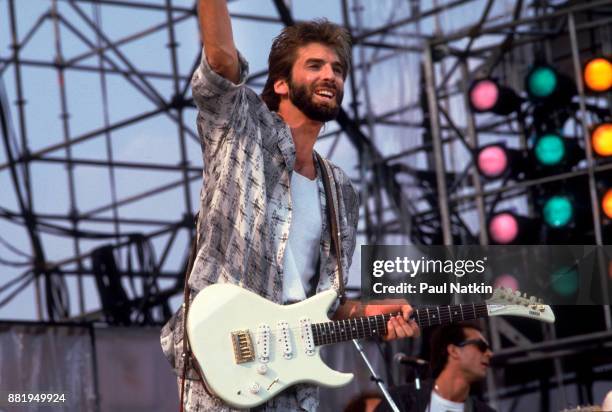 Kenny Loggins performs at Live Aid at Veteren's Stadium in Philadelphia, Pennsylvania, July 13, 1985 .