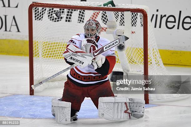 Cam Ward of the Carolina Hurricanes makes a save against the Pittsburgh Penguins in Game Two of the Eastern Conference Championship during the 2009...