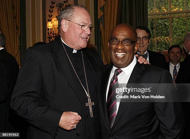 Arch Bishop Timothy M. Dolan and Al Rocker attend the 26th annual Calvary Hospital awards gala at The Pierre Hotel on June 3, 2009 in New York City.