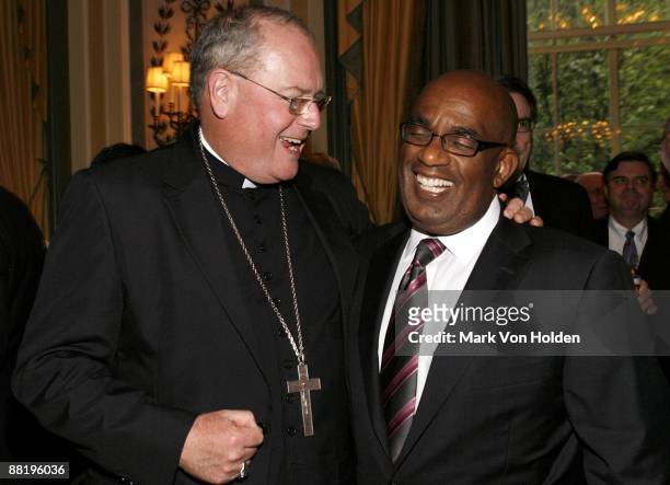 Arch Bishop Timothy M. Dolan and Al Rocker attend the 26th annual Calvary Hospital awards gala at The Pierre Hotel on June 3, 2009 in New York City.