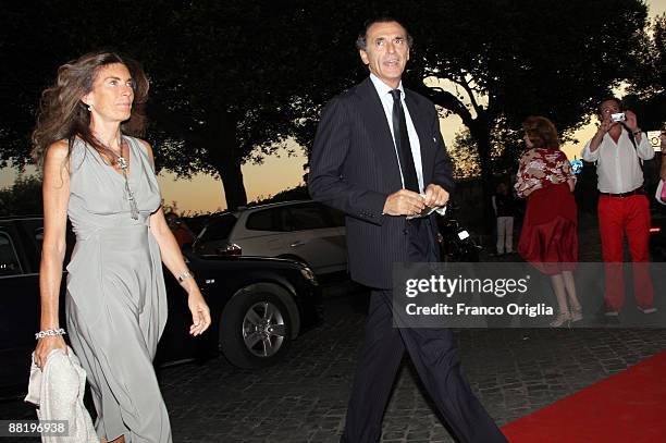 Rosy Greco and Ferdinando Brachetti Peretti arrive at Marina Cicogna Opening Exhibition at Villa Medici on June 3, 2009 in Rome, Italy.