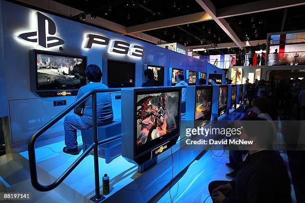Showgoers try out games at the PlayStation 3 exhibit at the 2009 E3 Expo on June 3, 2009 in Los Angeles, California. The 2009 E3 Expo features over...