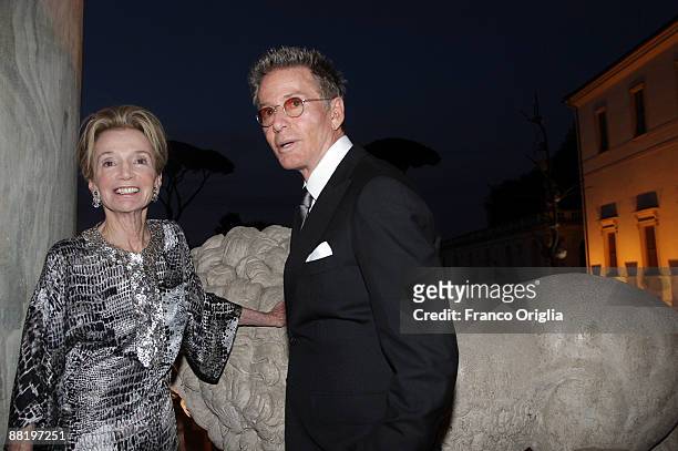 Lee Radziwill, the sister of Jacqueline Kennedy Onassis, and stylist Calvin Klein attend Marina Cicogna Opening Exhibition dinner at Villa Medici on...