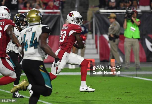 Jaron Brown of the Arizona Cardinals catches a touchdown pass against the Jacksonville Jaguars at University of Phoenix Stadium on November 26, 2017...