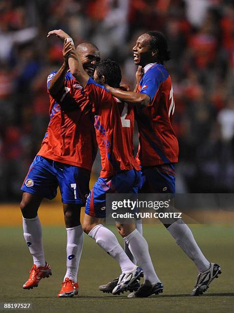 Costa Ricans Pablo Herrera , Junior Diaz and Andy Herron celebrate after scoring against the US during their FIFA World Cup South Africa-2010...