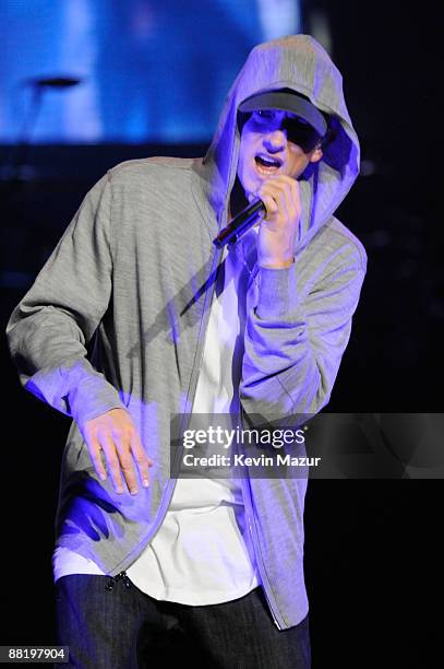 Rapper Eminem performs at the launch of "DJ Hero" hosted by ActiVision held at The Wiltern on June 1, 2009 in Los Angeles, California.