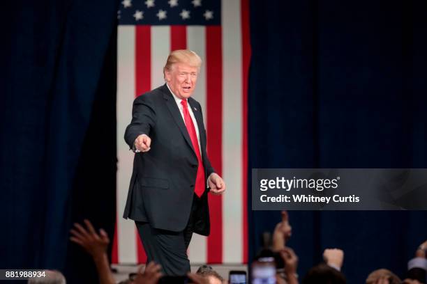 President Donald Trump greets supporters before his speech on tax reform at the St. Charles Convention Center on November 29, 2017 in St. Charles,...