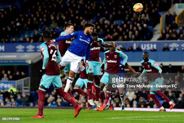 Ashley Williams heads to score during the Premier League match between Everton and West Ham United at Goodison Park on November 29, 2017 in...