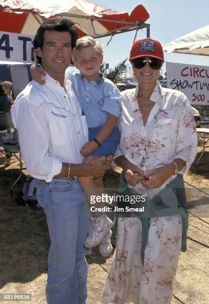 Pierce Brosnan, Cassandra Harris, and son Sean
