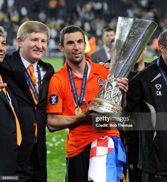 Shakhtar Donetsk owner Rinat Akhmetov and captain Darijo Srna celebrate with the trophy after victory in the UEFA Cup Final between Shakhtar Donetsk...