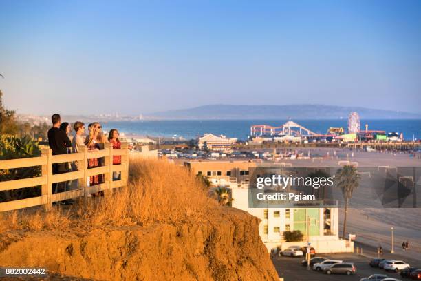 people look out over santa monica beach california usa - palisades park santa monica stock pictures, royalty-free photos & images