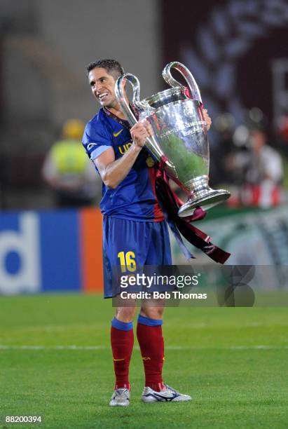 Sylvinho of Barcelona celebrates with the trophy after the UEFA Champions League Final match between Barcelona and Manchester United at the Stadio...