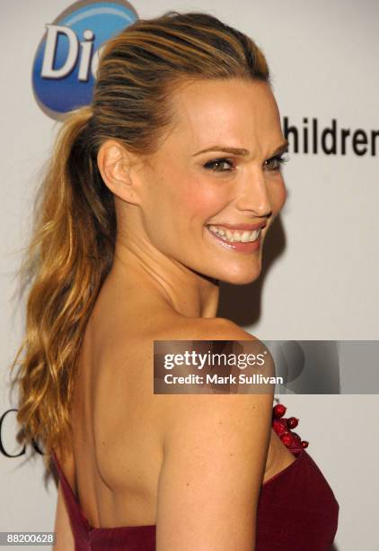 Actress Molly Sims debuts a one-of-a-kind dress made of thousands of real cranberries created by top designer Kevan Hall at the 21st Annual Spring...