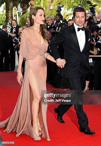 Actors Angelina Jolie and Brad Pitt attend the 'Inglourious Basterds' Premiere at the Grand Theatre Lumiere during the 62nd Annual Cannes Film...